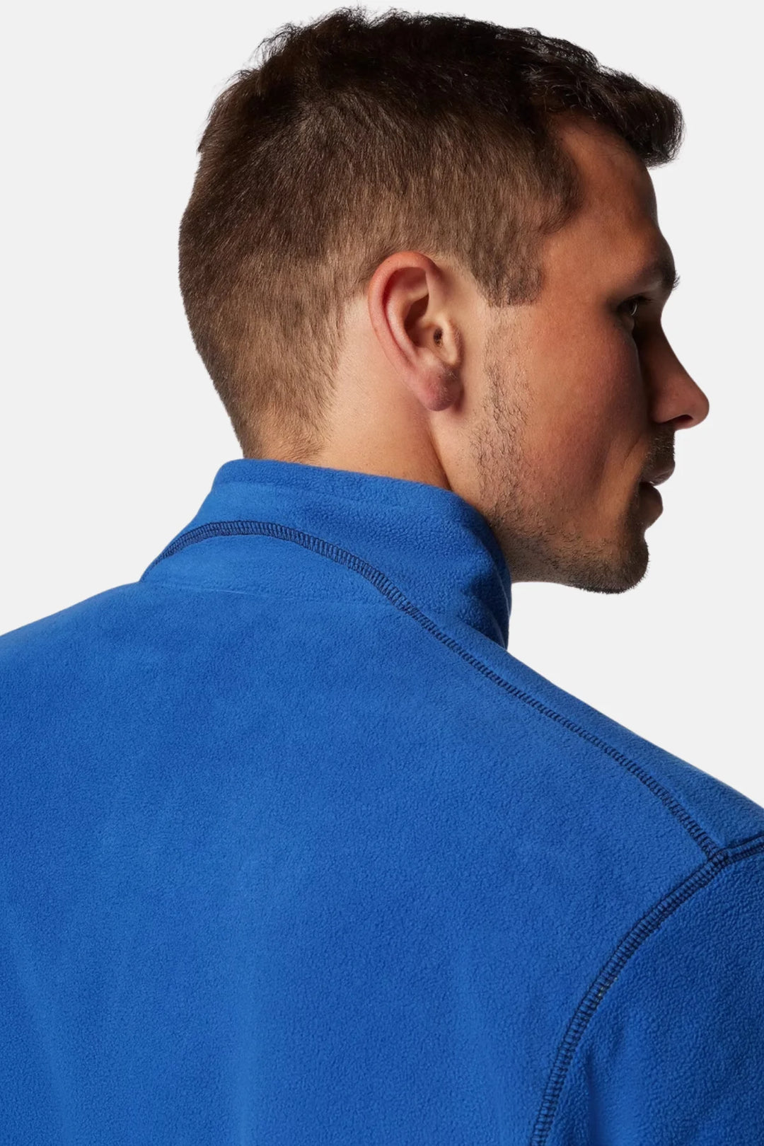 Men's blue fleece half-zip pullover, side view of high collar