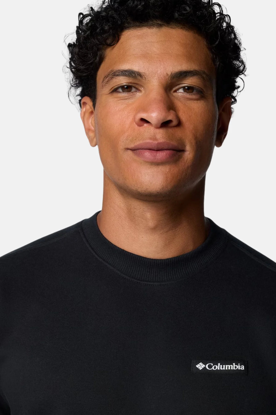 Columbia Meridian Creek™ black sweatshirt with embroidered chest logo detail.