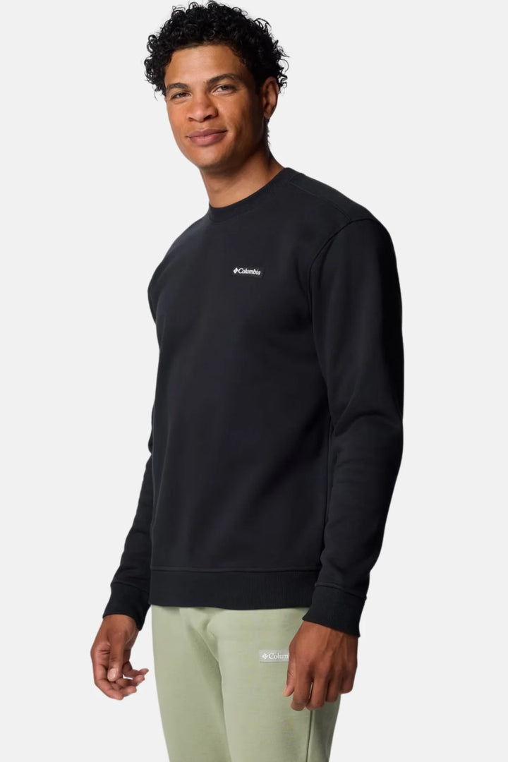 Columbia Meridian Creek™ black crewneck sweatshirt, side view with chest logo.