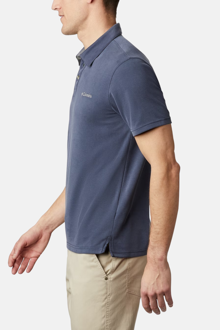 Columbia collegiate navy polo shirt, short sleeves, button placket, curved hem.