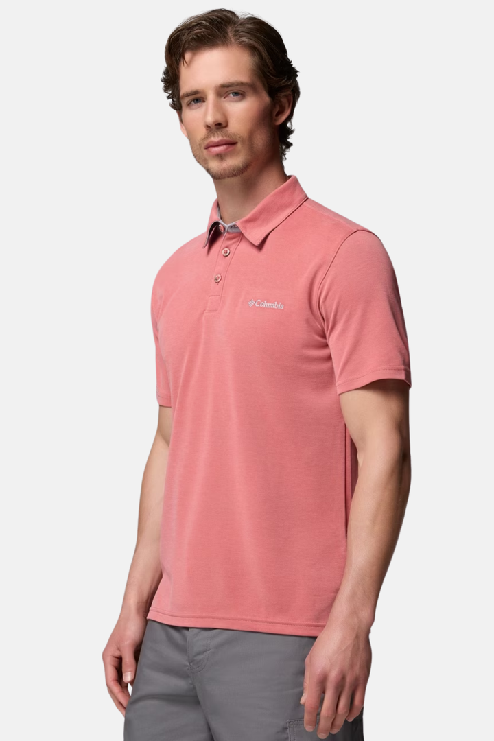 Washed red polo shirt with buttoned collar, short sleeves, small chest logo