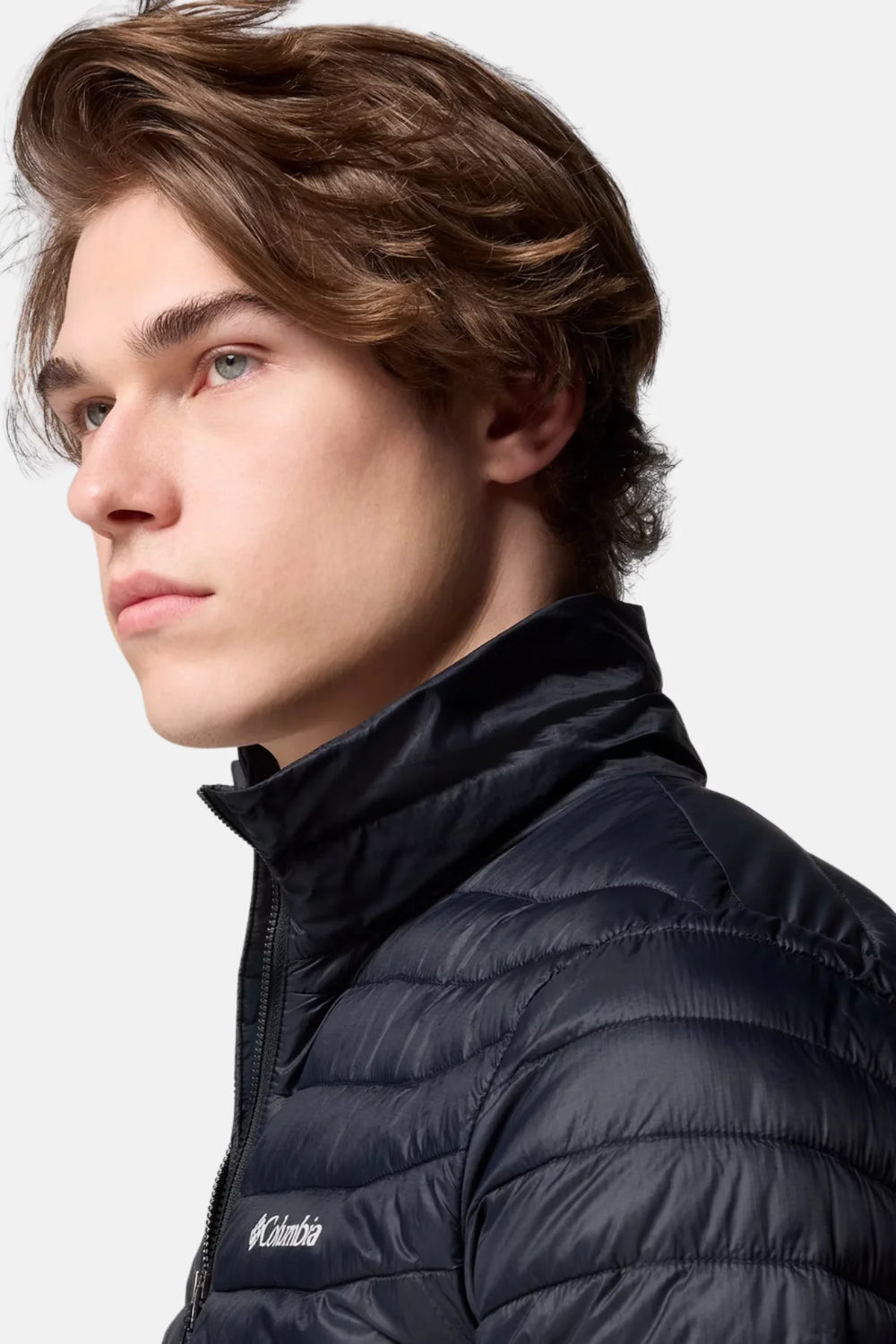 Dark insulated puffer jacket collar with full-zip seam and chest logo patch