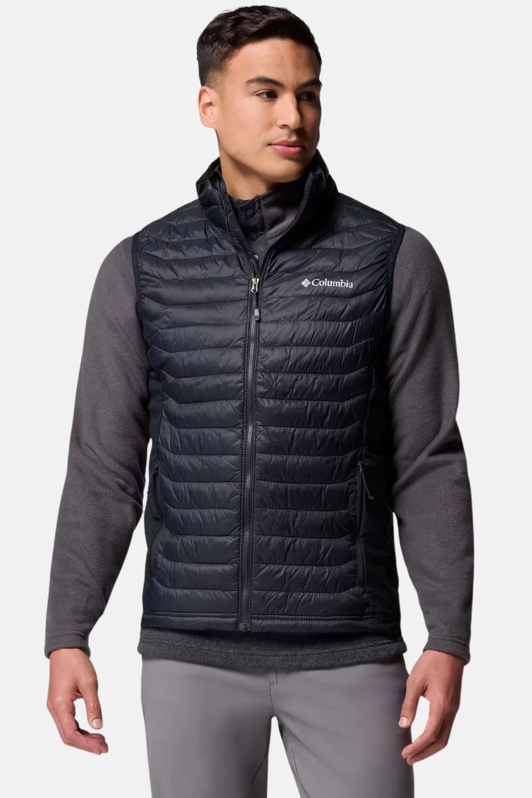Black quilted puffer vest with full-zip front and stand collar, Columbia logo