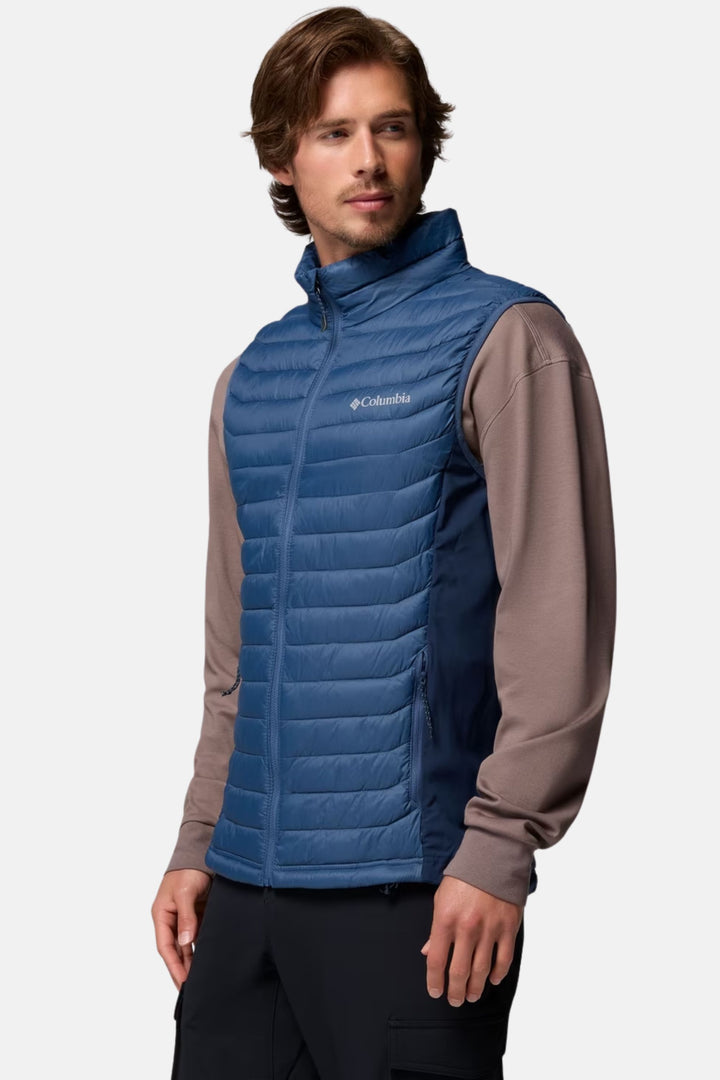 Men's blue puffer vest with quilted panels and zip front