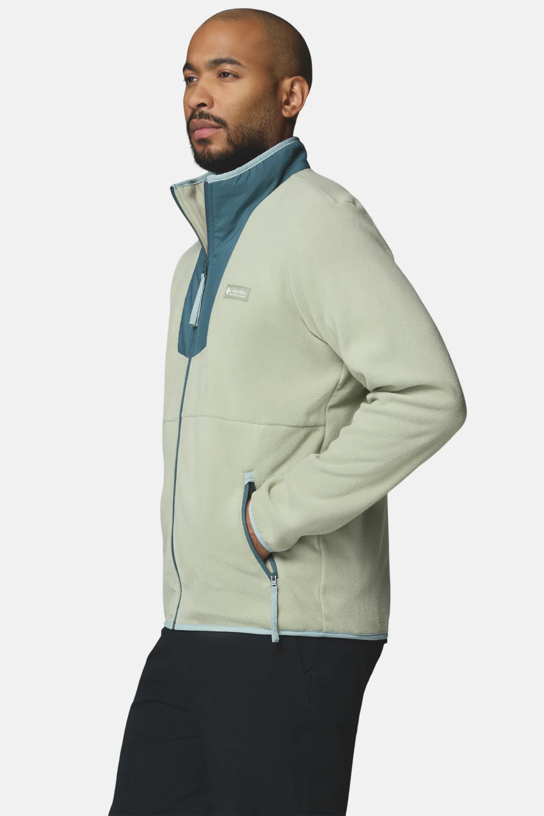 Light green full-zip fleece jacket with blue inner placket and zip hand pockets
