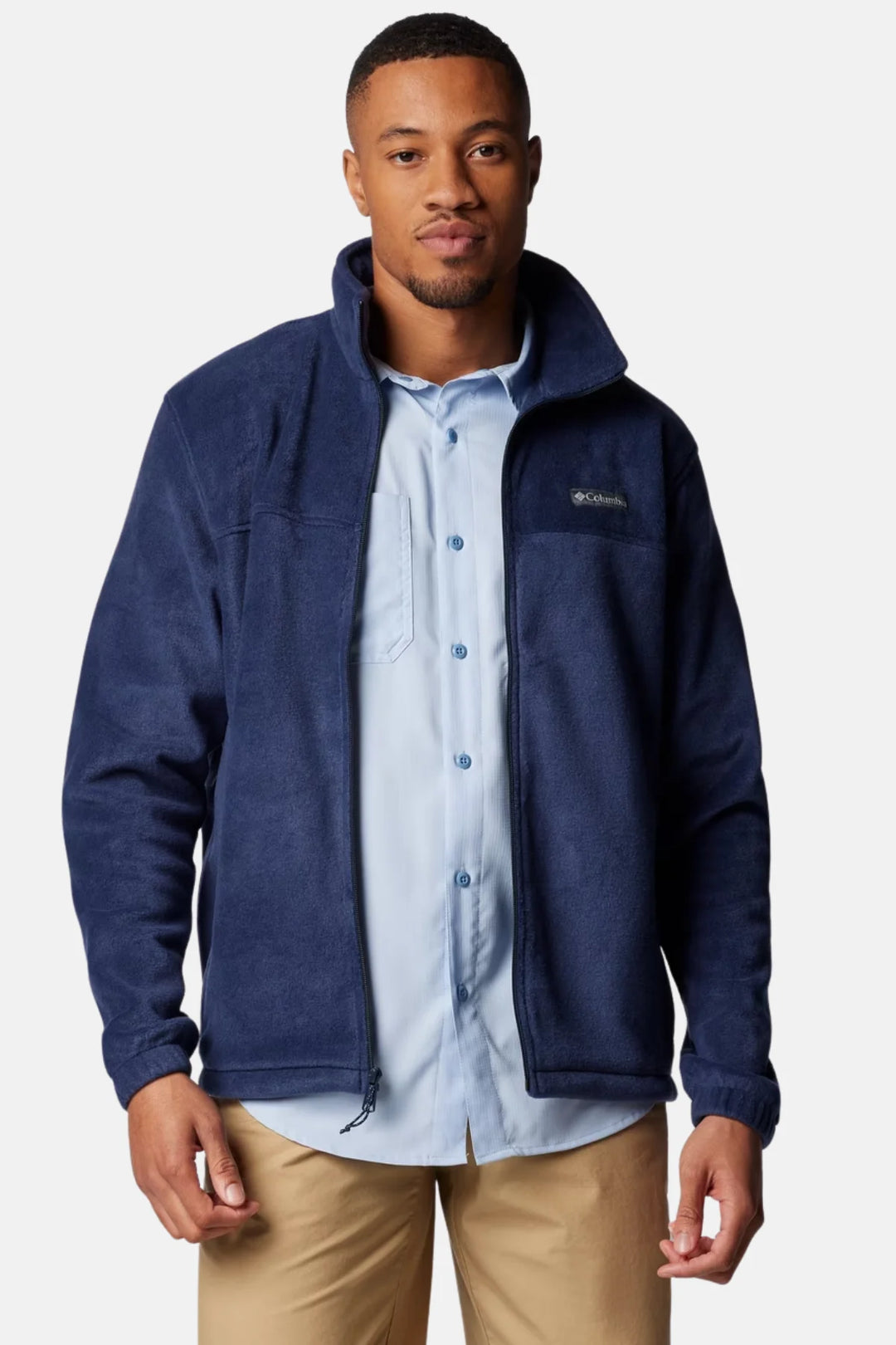 Columbia full-zip fleece jacket in collegiate navy, worn open over a button shirt