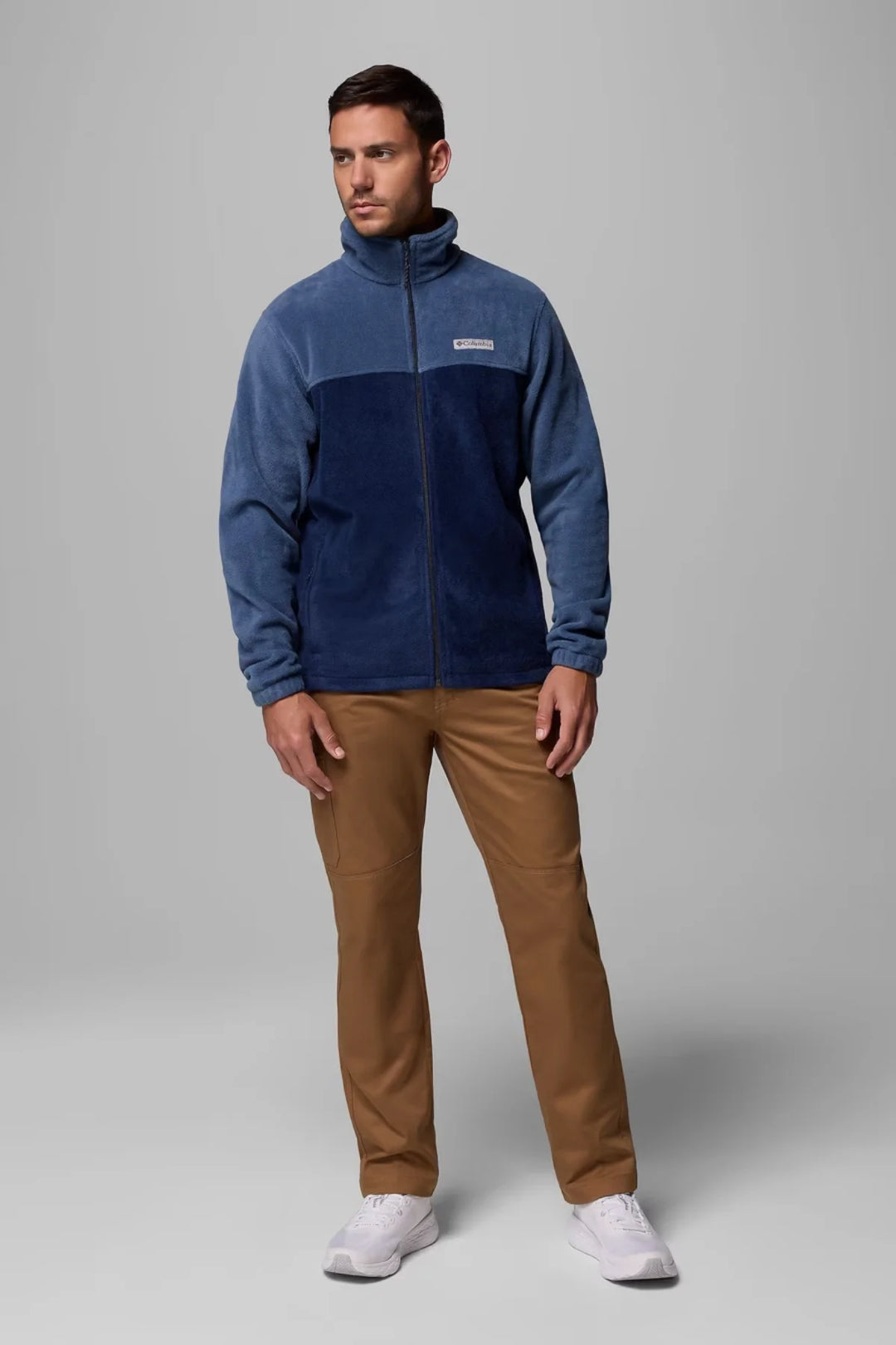 Men's fleece full-zip jacket in navy with stand collar and logo chest patch
