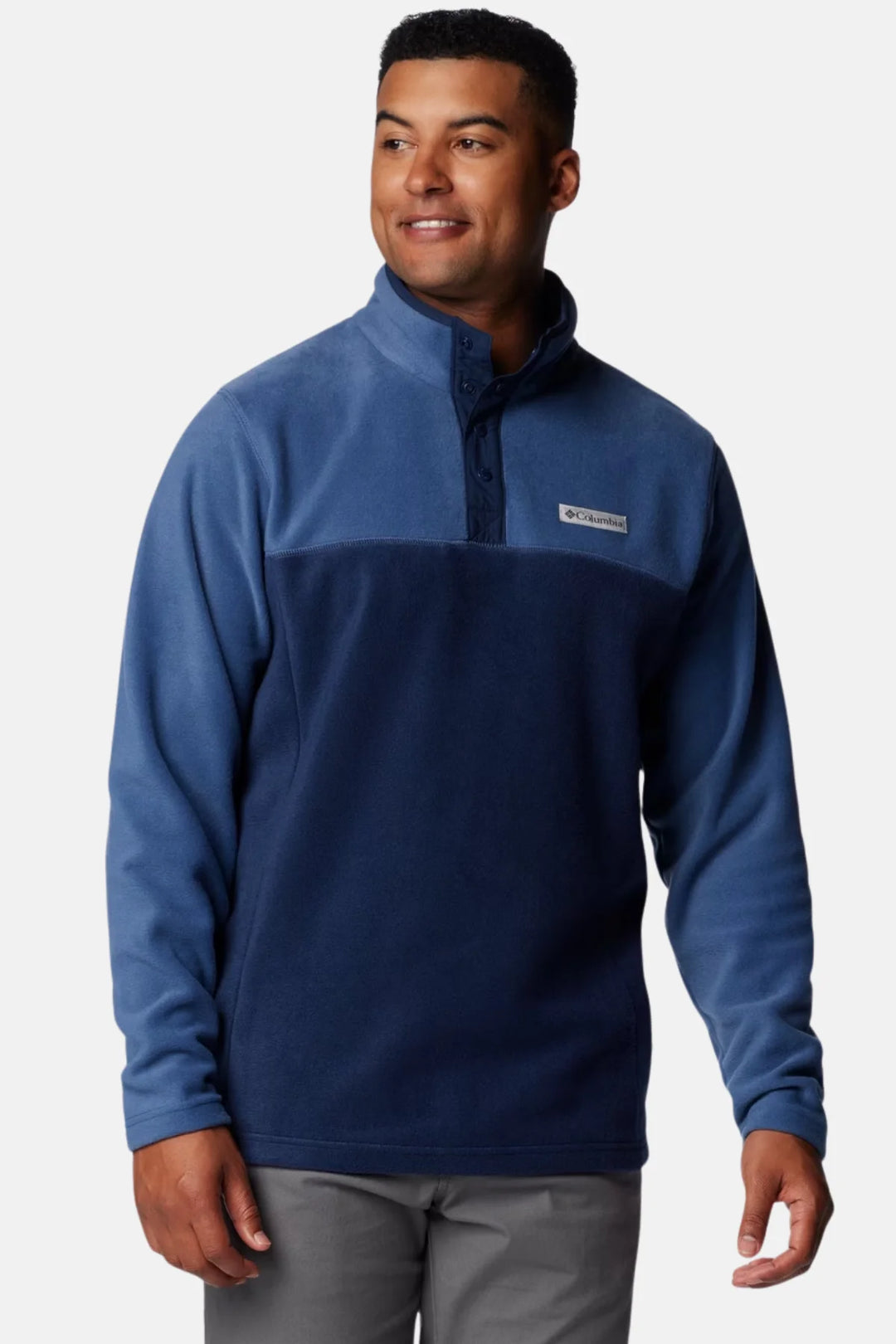 Men's blue fleece half-snap pullover with dark chest panel and stand collar