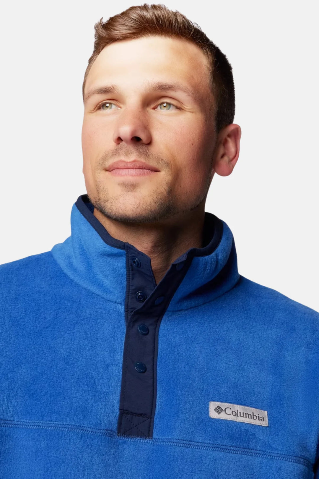 Blue Columbia half-snap fleece pullover with stand collar and logo patch at chest