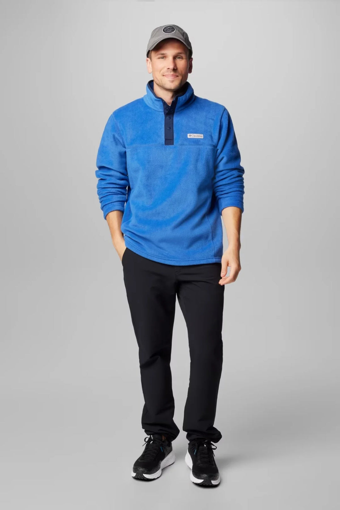 Blue men’s half-snap fleece top with stand collar, chest logo, long sleeves