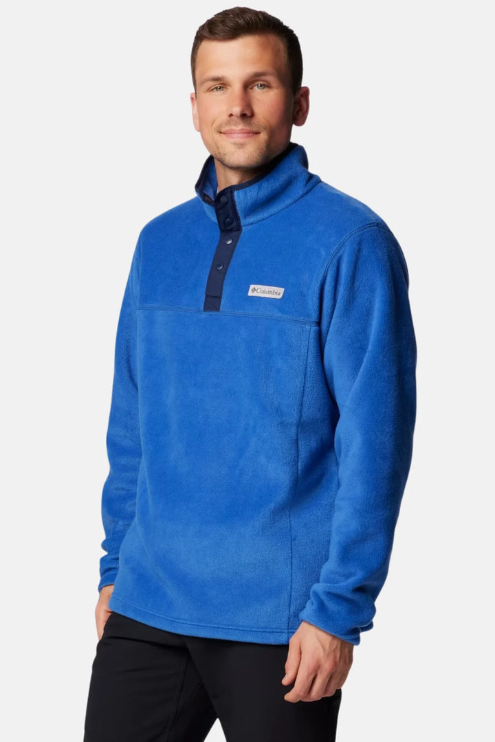 Blue half-snap fleece top with stand collar and embroidered chest logo, long sleeves