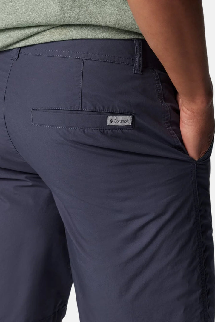Washed out shorts in dark navy with logo patch and side pocket