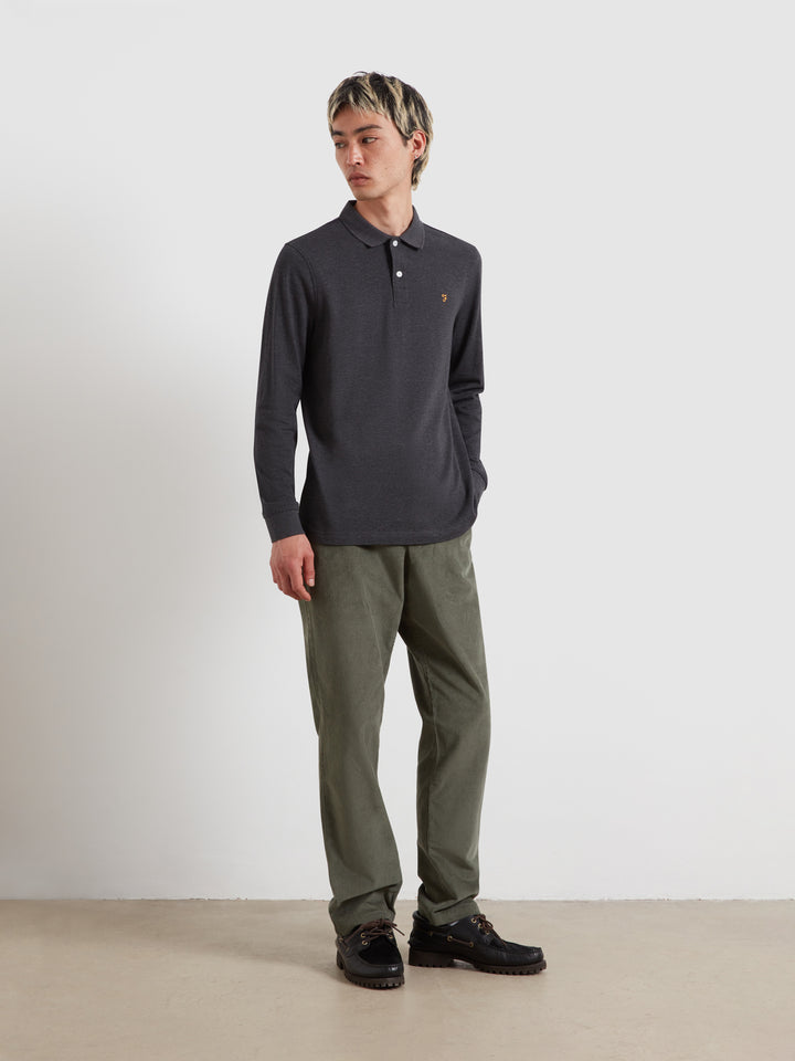 Washed black marl long-sleeve polo shirt, standing view, with collar and chest logo.