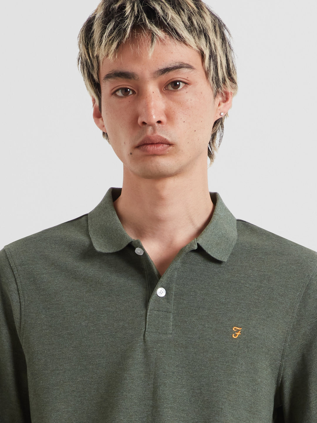 Dark green long-sleeve polo shirt with button placket, collar, and small chest logo