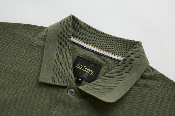 Olive long-sleeve polo shirt with ribbed collar and brand label