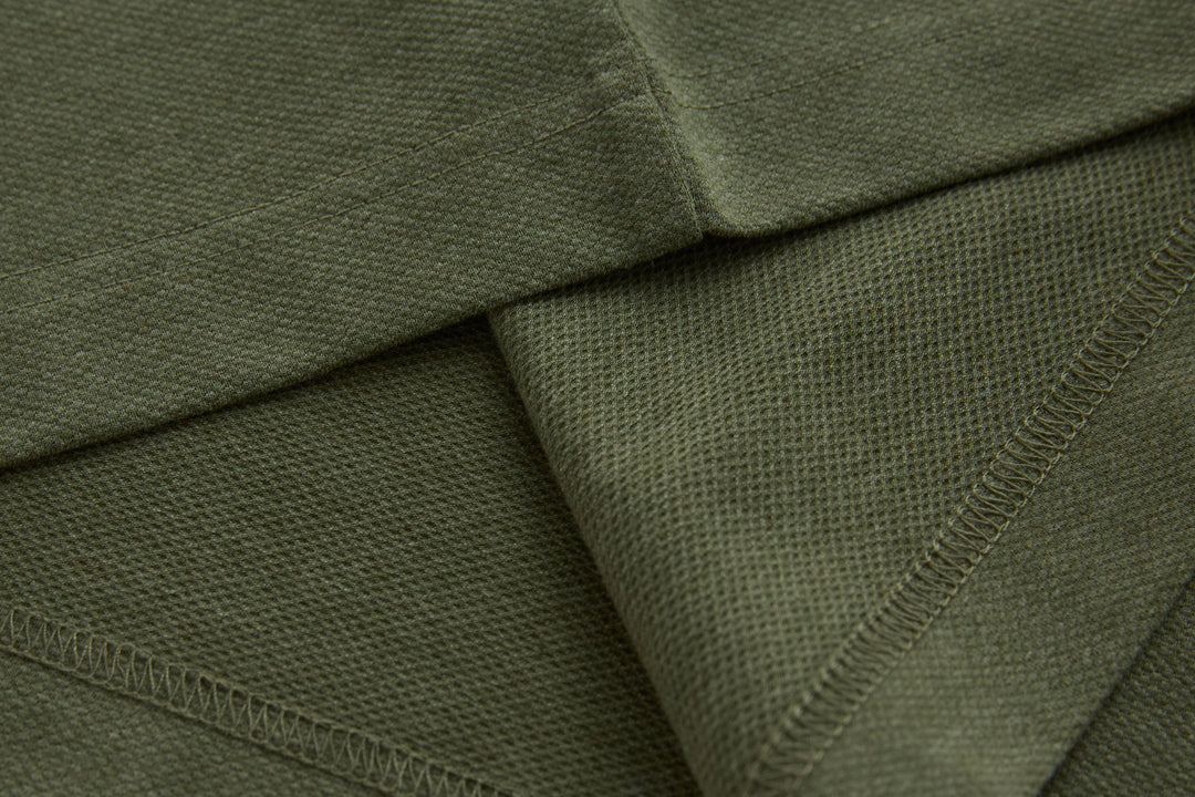 Olive long-sleeve polo shirt interior hem stitching detail