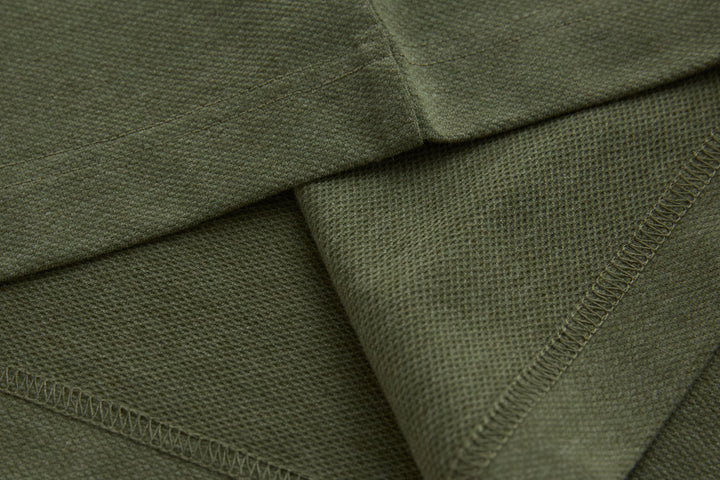 Olive long-sleeve polo shirt interior hem stitching detail