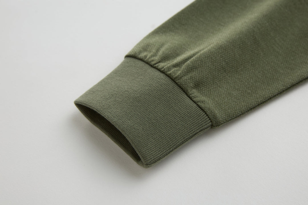 Olive long-sleeve polo shirt with ribbed sleeve cuff