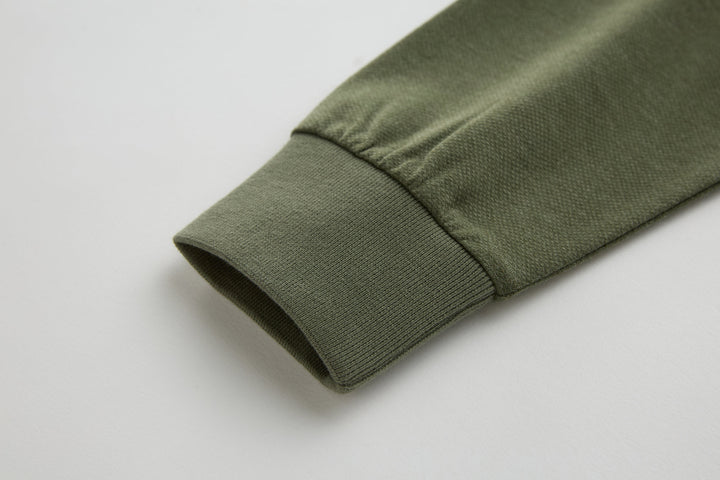Olive long-sleeve polo shirt with ribbed sleeve cuff