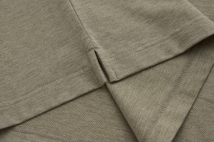 Olive polo shirt collar and placket seam detail