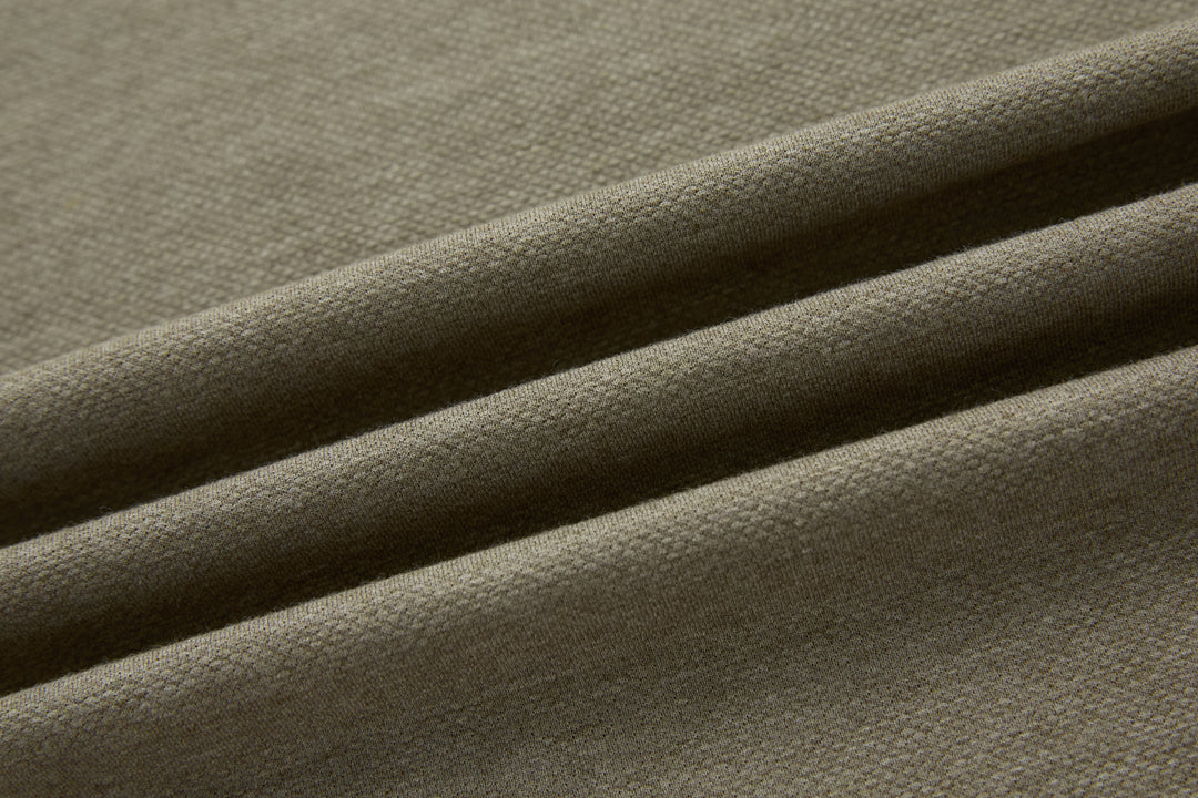 Olive polo shirt fabric texture close-up