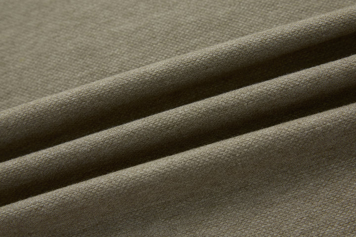 Olive polo shirt fabric texture close-up