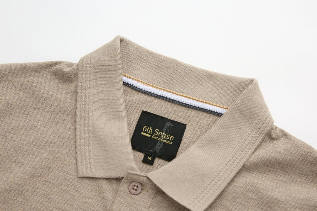 Beige polo shirt with button placket and contrast inside collar trim