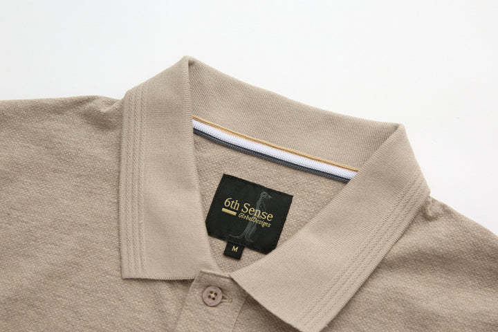 Beige polo shirt with button placket and contrast inside collar trim