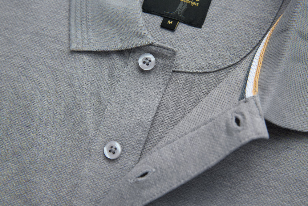Light gray polo shirt with buttoned placket and textured neckline stitching