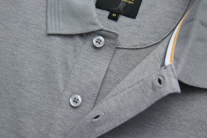 Light gray polo shirt with buttoned placket and textured neckline stitching