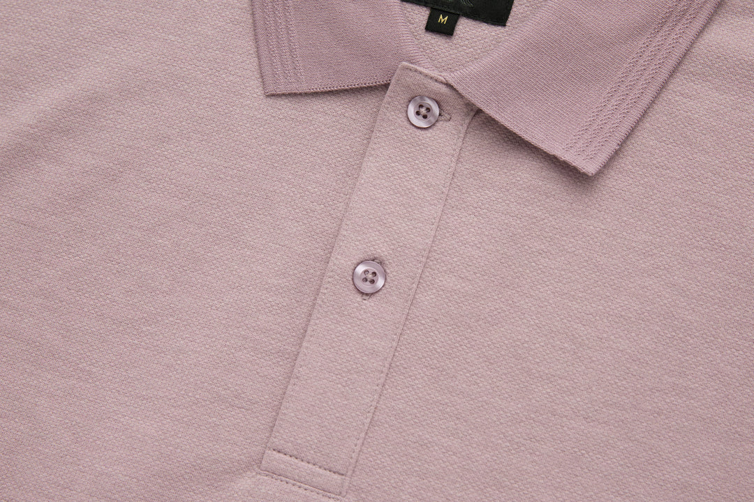 Woodrose polo shirt placket with two visible buttons and textured knit