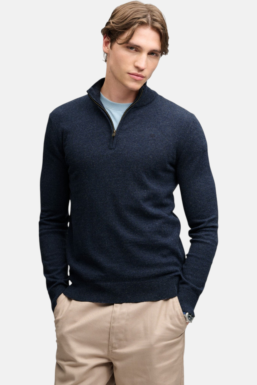 Lightweight half-zip sweater in navy marl knit with half-zip collar and long sleeves