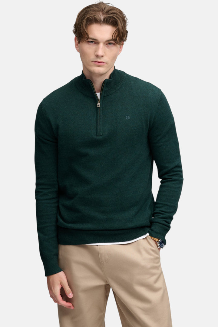 Lightweight half-zip sweater in deep pine green with small chest logo