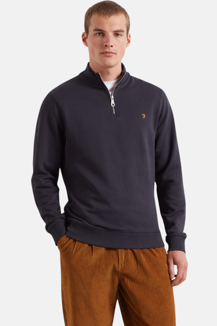 Men's navy 1/4-zip sweater with zip collar and small chest logo