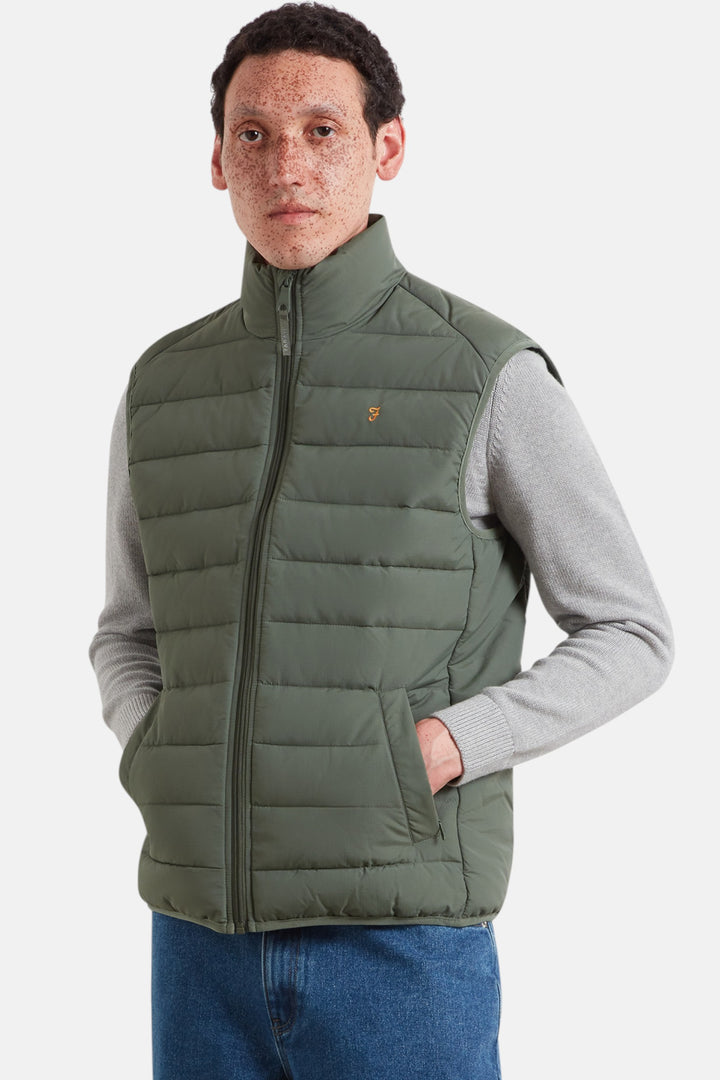 Olive-green quilted wadded gilet vest with full front zip and stand collar