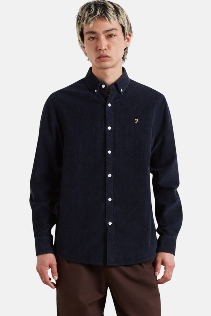 Men's long-sleeve navy button-up shirt with button placket and small chest logo