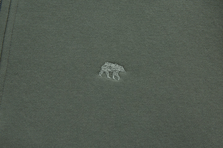 Olive 1/4-zip top with small chest animal logo embroidery