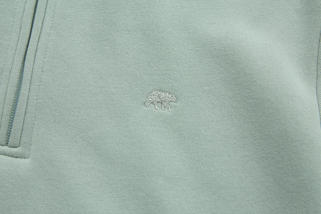 Jade 1/4-zip top chest logo embroidery