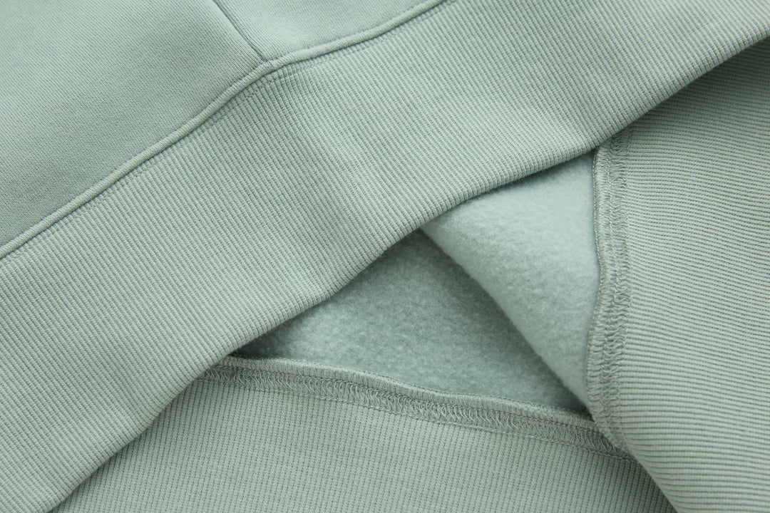 Jade 1/4-zip top collar lining and seam detail