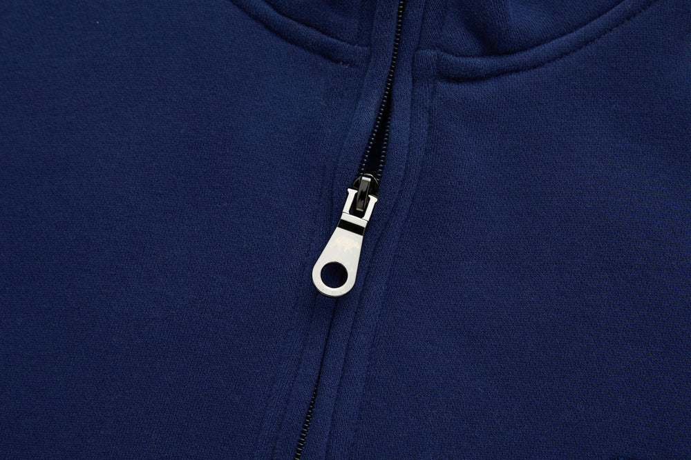 Dark blue 1/4-zip top with metal zipper and pull tab