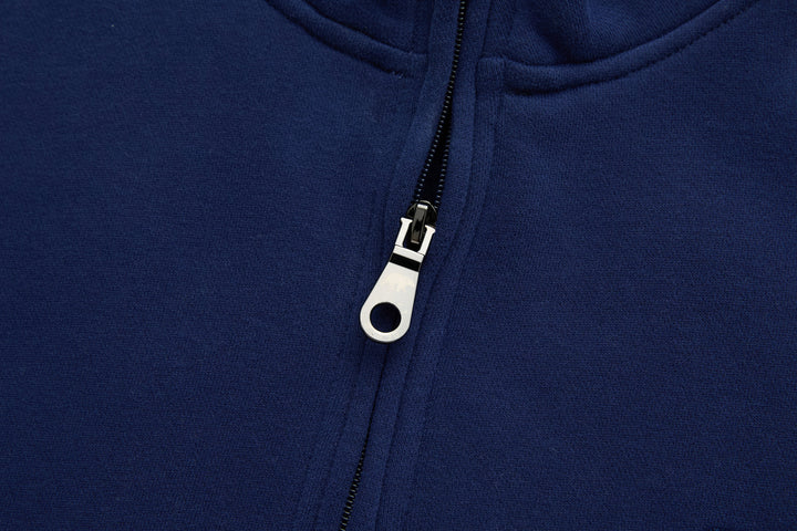 Dark blue 1/4-zip top with metal zipper and pull tab