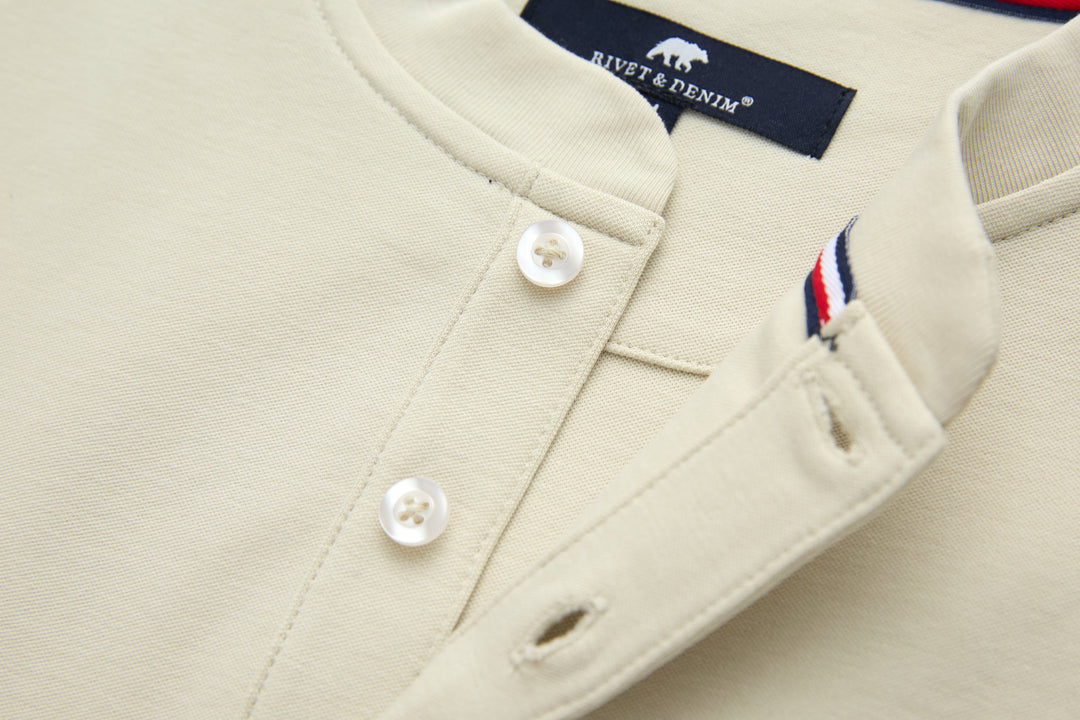Bone denim top with button placket and contrast trim inside collar