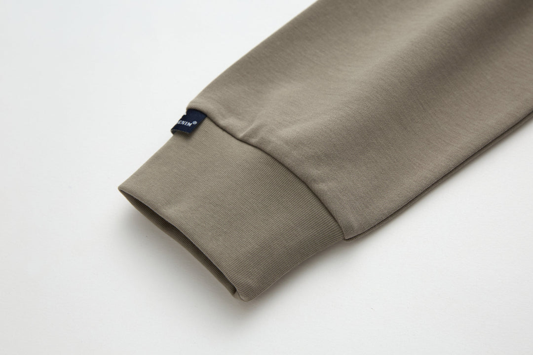 Cinder grandad top sleeve hem with folded cuff and brand label