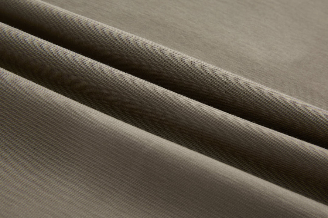 Cinder grandad top fabric close-up with textured, denim-like weave