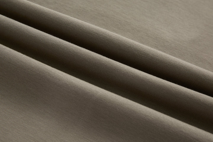 Cinder grandad top fabric close-up with textured, denim-like weave