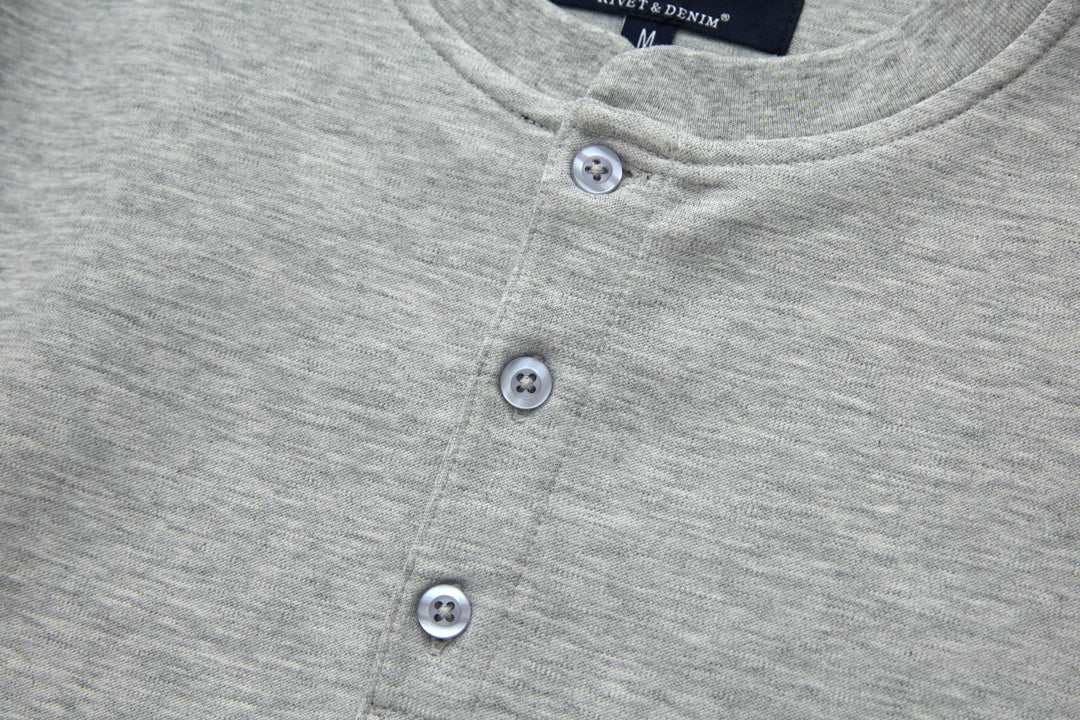 Heather gray grandad-style button placket close-up with three buttons