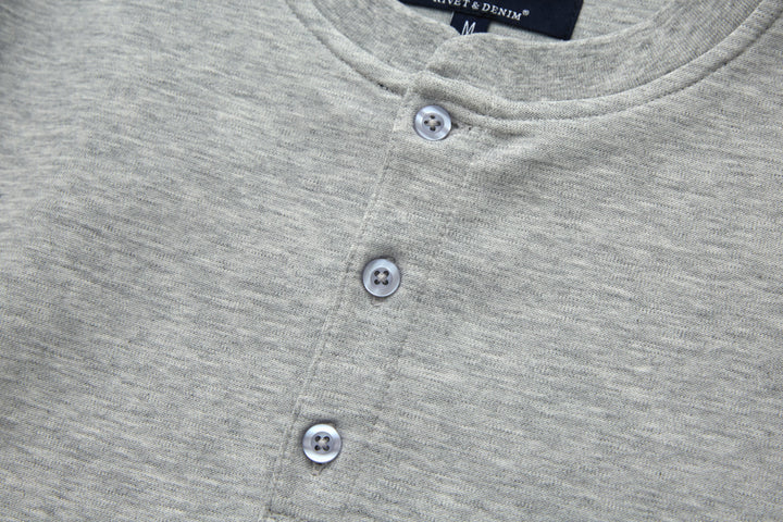Heather gray grandad-style button placket close-up with three buttons