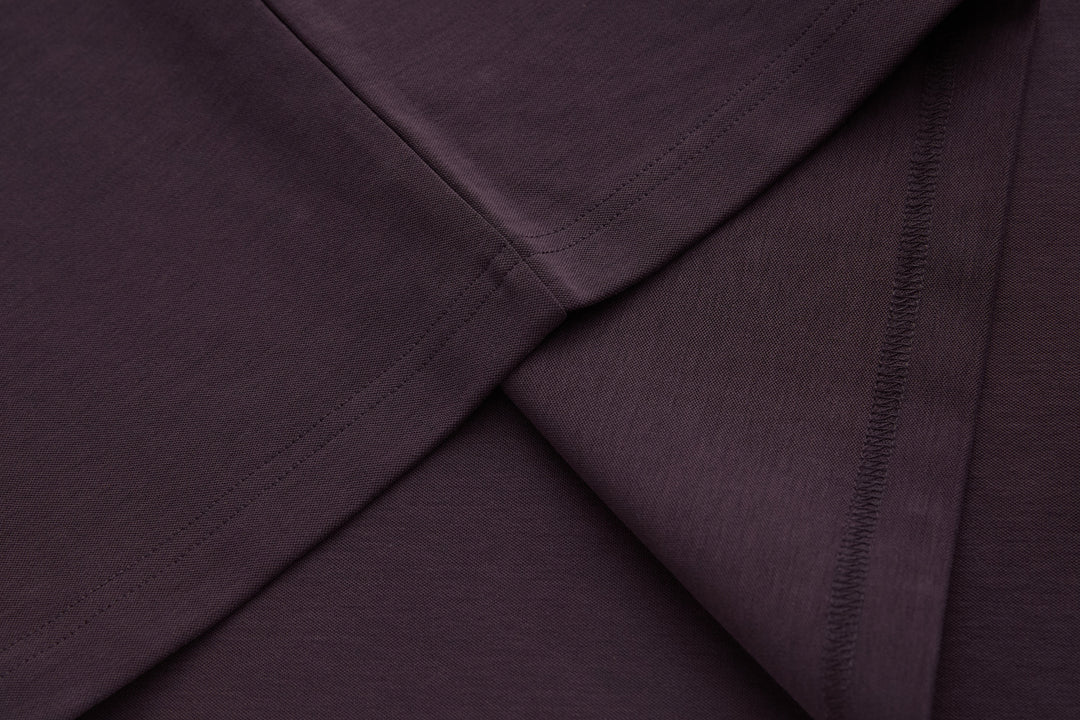 Raisin grandad-style top sleeve seam and side hem, smooth knit finish