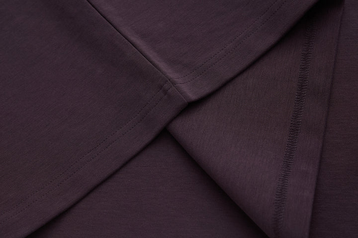Raisin grandad-style top sleeve seam and side hem, smooth knit finish