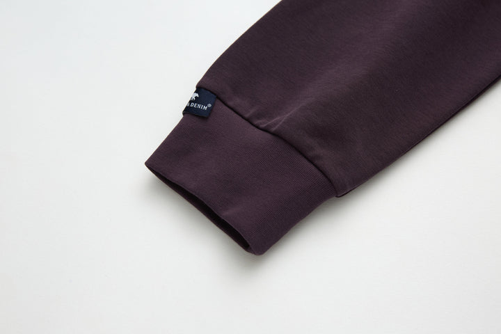 Raisin grandad-style top with stitched cuff and hem, folded sleeve end
